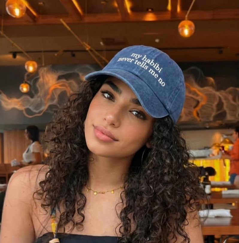"Habibi never tells me no" Cap