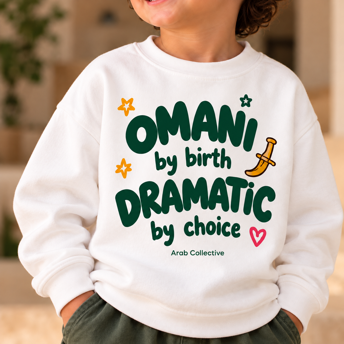 "OMANI BY BIRTH DRAMATIC BY CHOICE" KIDS Crewneck