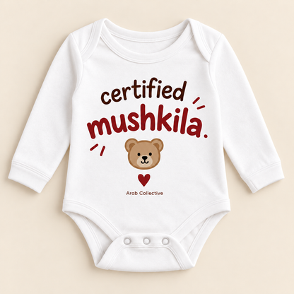 "CERTIFIED MUSHKILA" NEWBORN ONESIE LONG SLEEVE