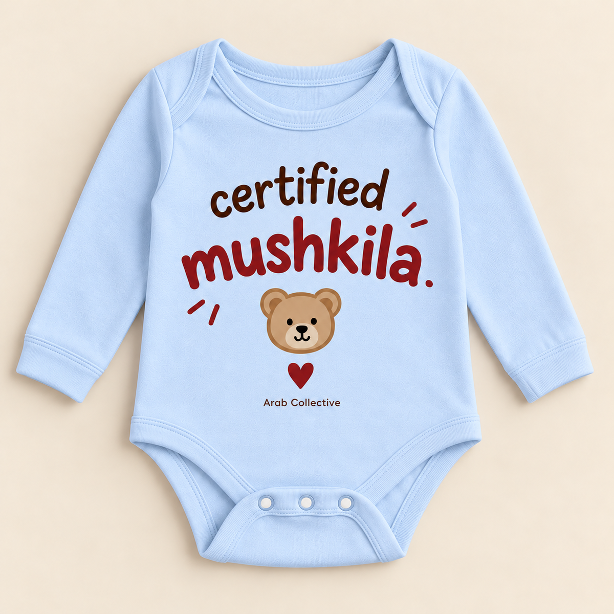 "CERTIFIED MUSHKILA" NEWBORN ONESIE LONG SLEEVE