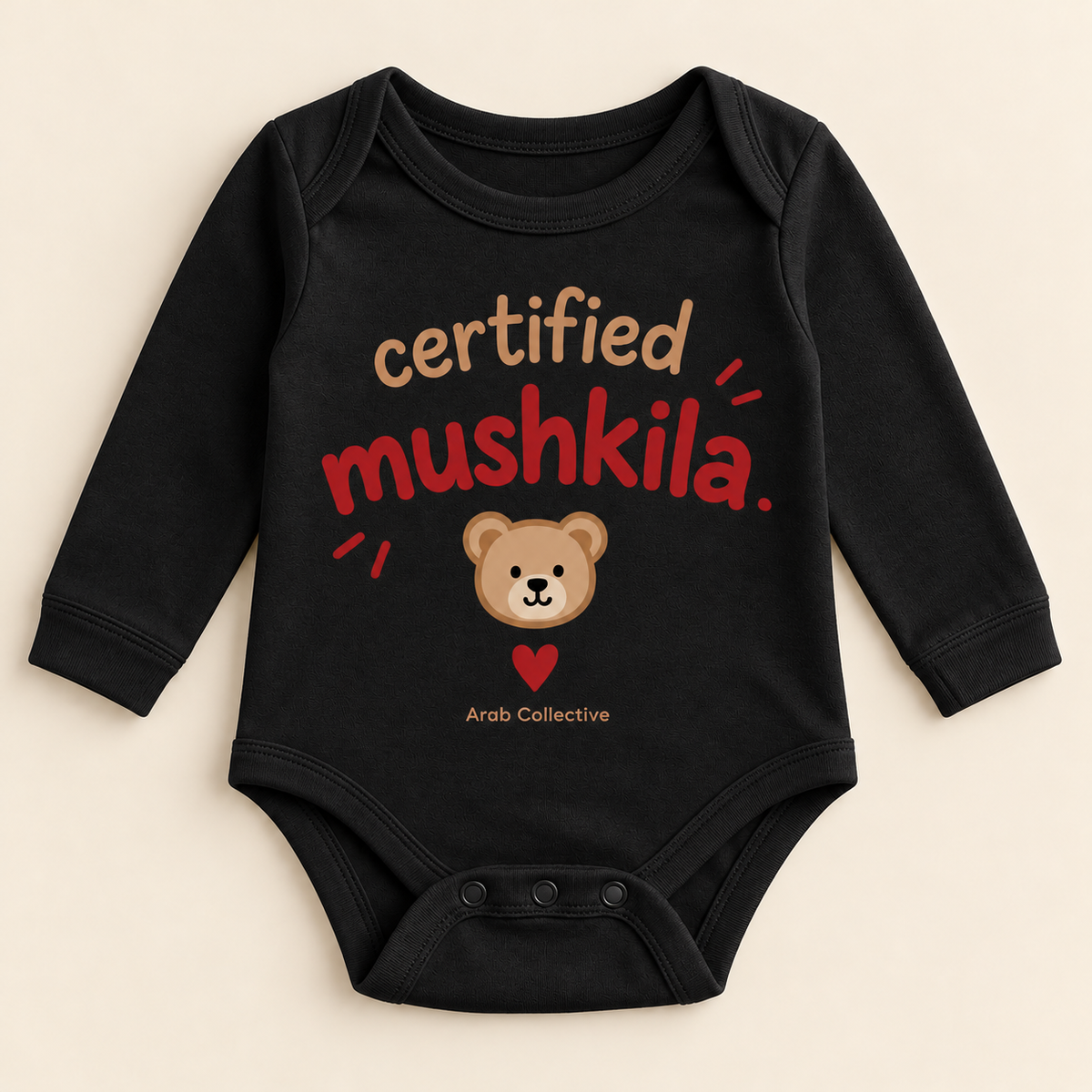 "CERTIFIED MUSHKILA" NEWBORN ONESIE LONG SLEEVE