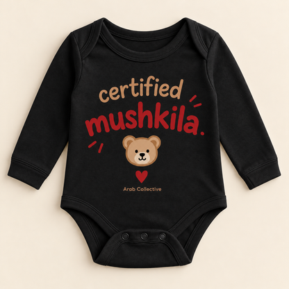 "CERTIFIED MUSHKILA" NEWBORN ONESIE LONG SLEEVE