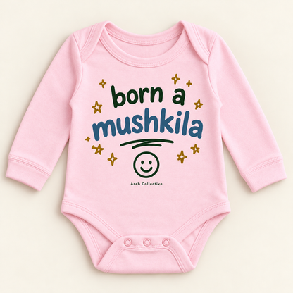 "BORN A MUSHKILA" NEWBORN ONESIE LONG SLEEVE