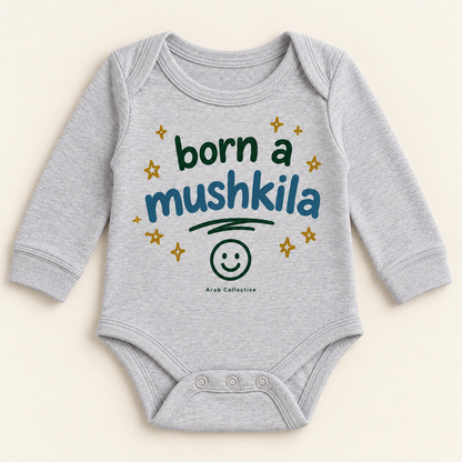 "BORN A MUSHKILA" NEWBORN ONESIE LONG SLEEVE