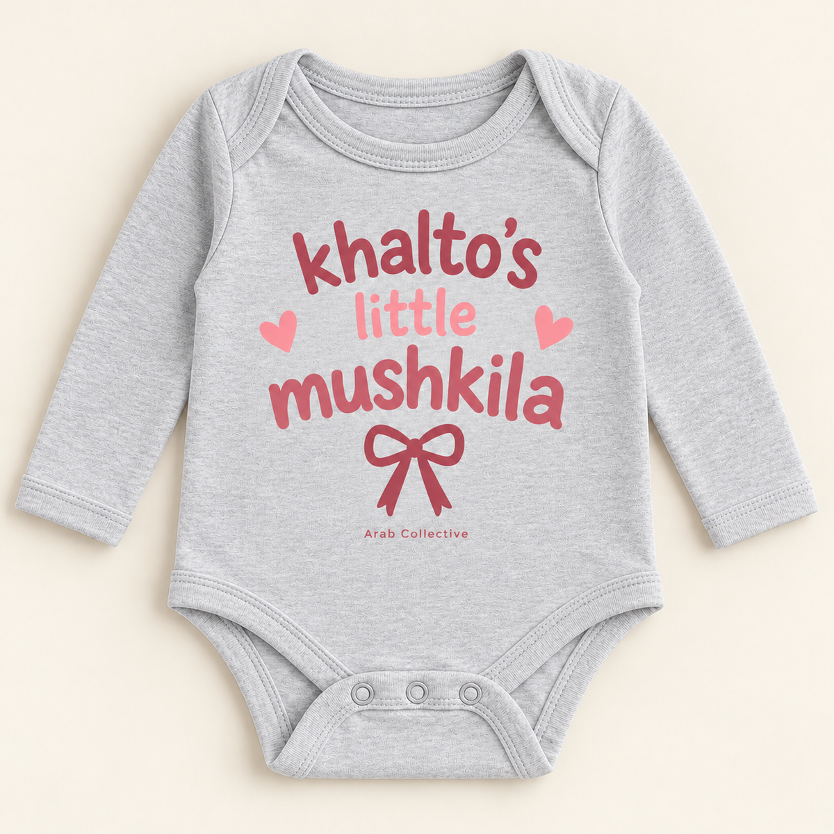 "KHALTO'S LITTLE MUSHKILA" NEWBORN ONESIE LONG SLEEVE