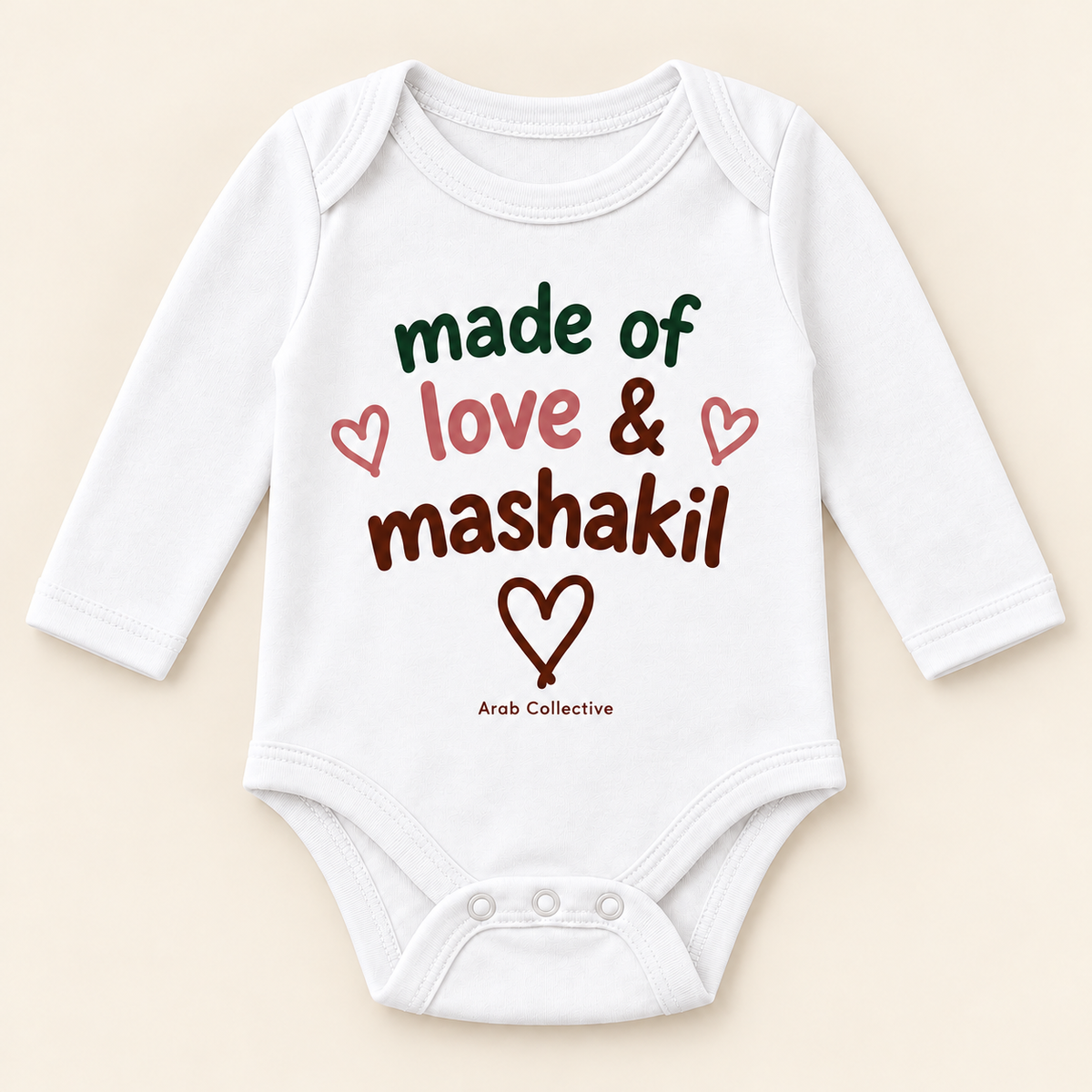 "MADE OF LOVE AND MASHAKIL" NEWBORN ONESIE LONG SLEEVE