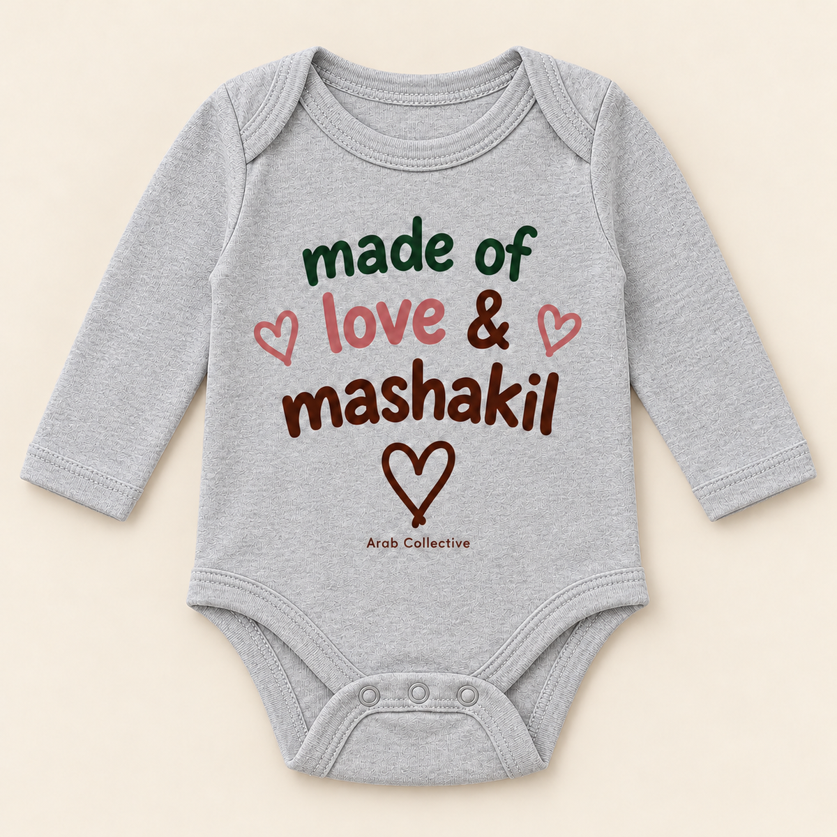 "MADE OF LOVE AND MASHAKIL" NEWBORN ONESIE LONG SLEEVE