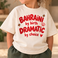 "BAHRAINI BY BIRTH DRAMATIC BY CHOICE" KIDS Tee