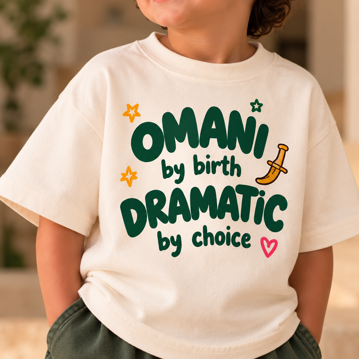 "OMANI BY BIRTH DRAMATIC BY CHOICE" KIDS Tee