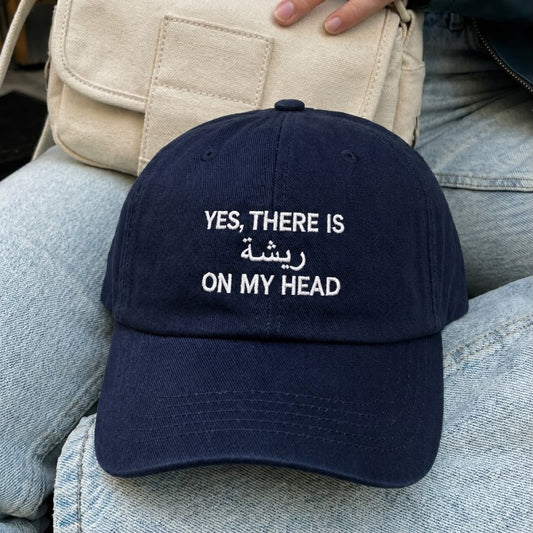 "There's a Feather On My Head" Cap