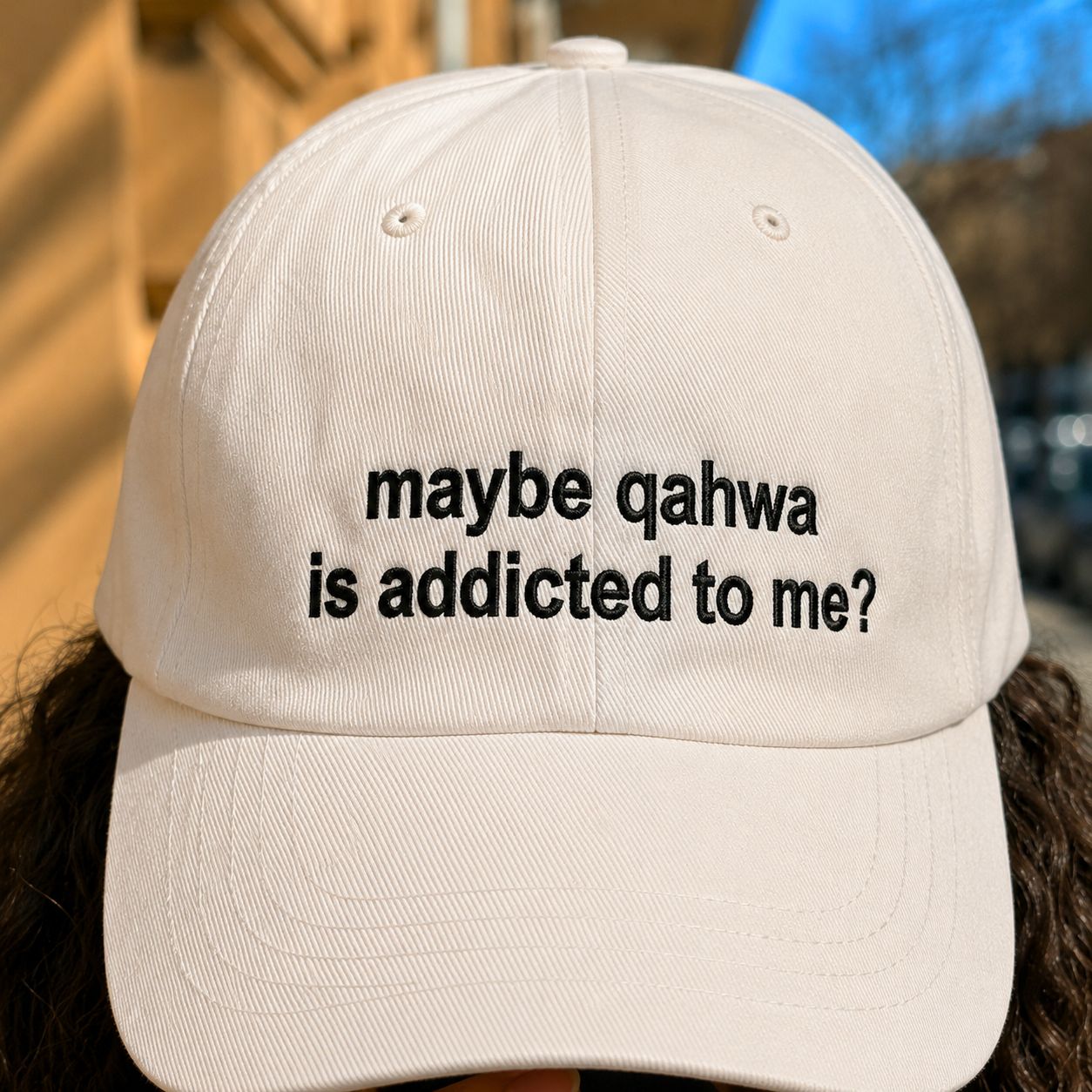 "Qahwa is addicted to me" Cap